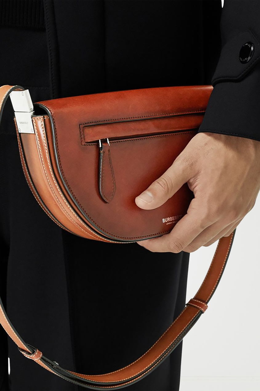 фото Компактная коричневая сумка из кожи olympia burberry