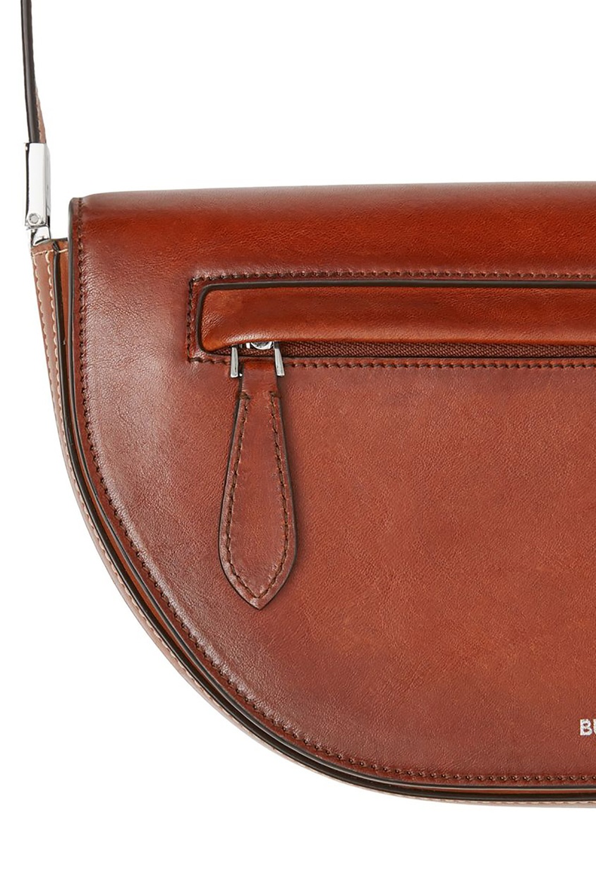 фото Компактная коричневая сумка из кожи olympia burberry