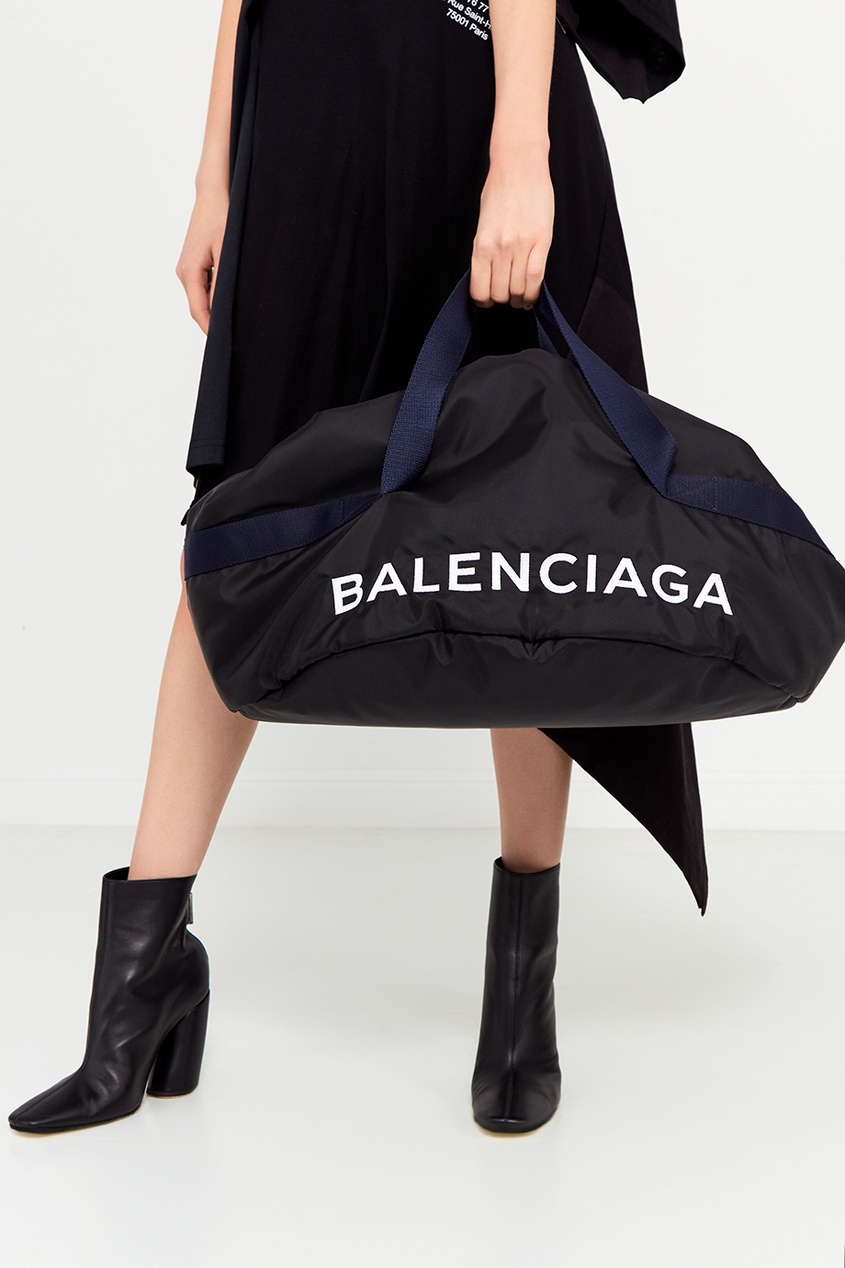 фото Синяя сумка с логотипом wheel balenciaga