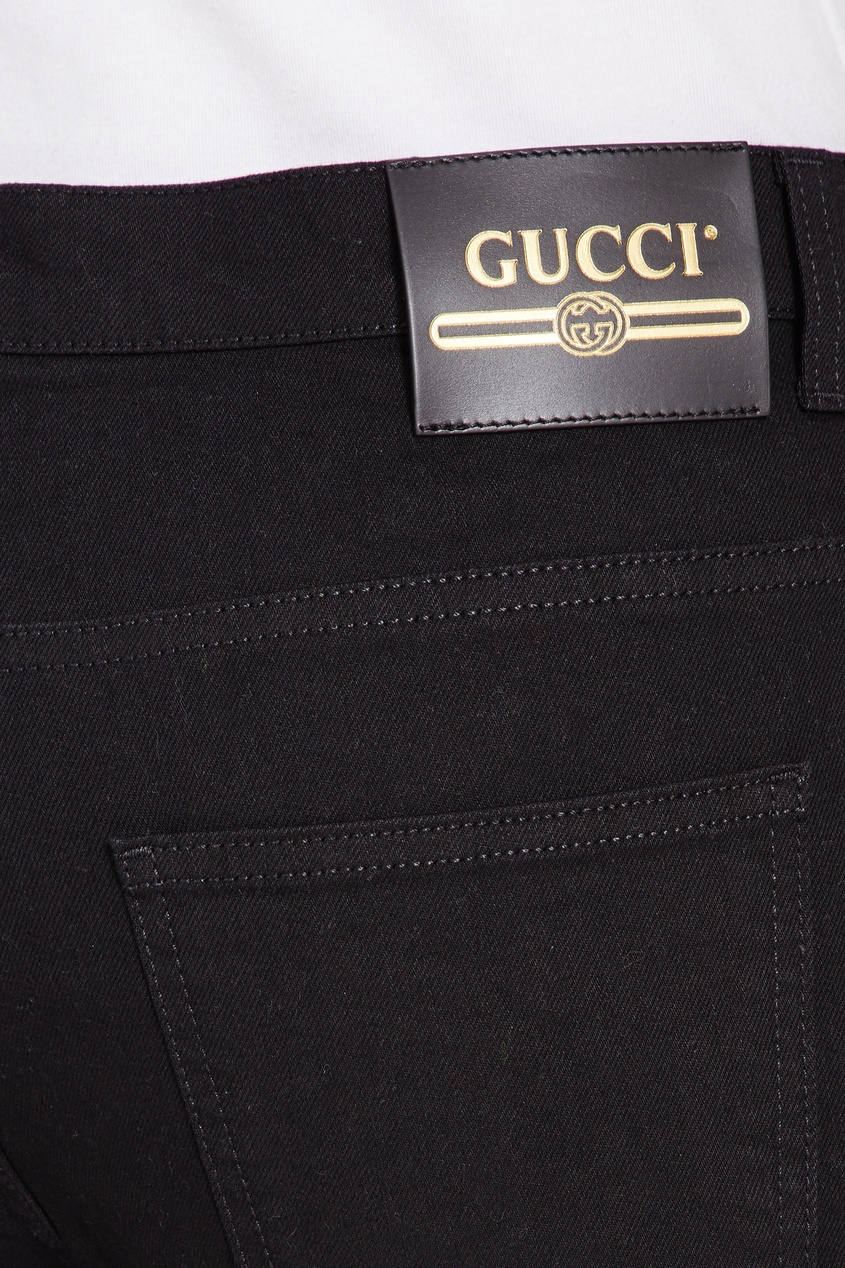 фото Черные джинсы из стрейч-денима gucci