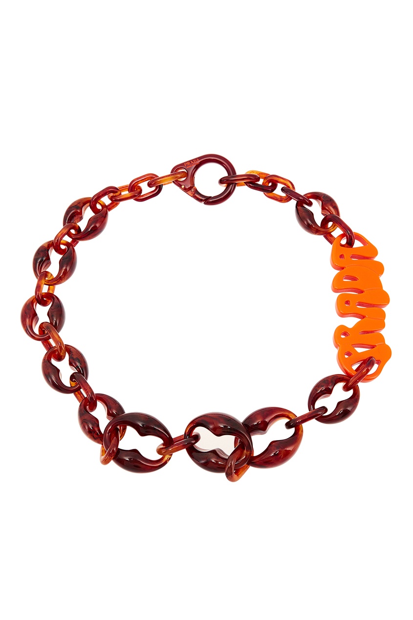фото Колье из плексигласа с оранжевым логотипом Prada