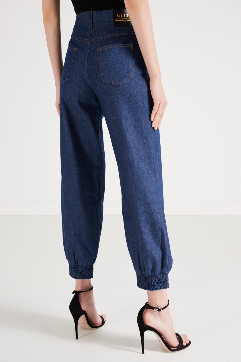 фото Синие джинсы с манжетами на резинке gucci
