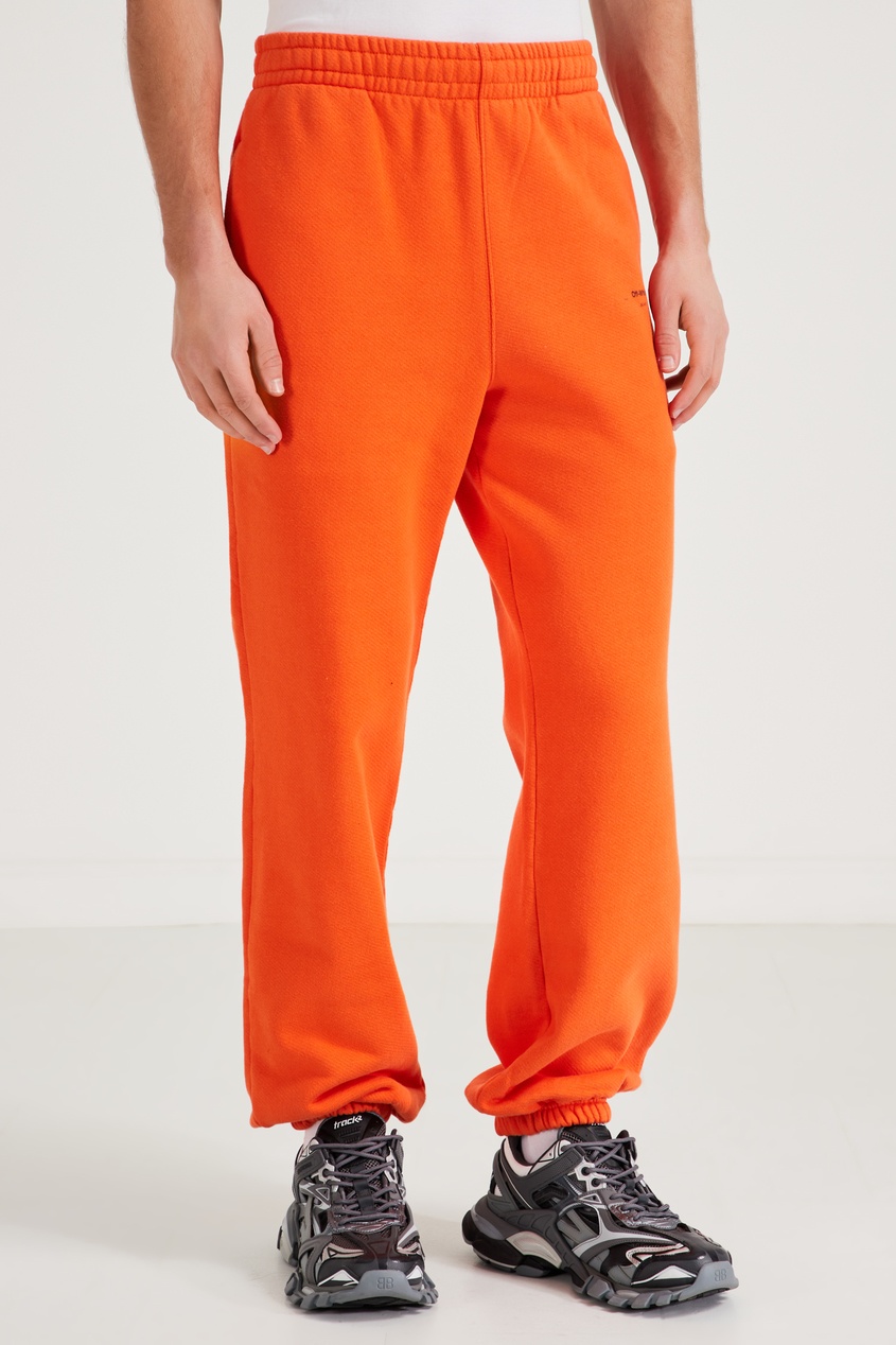 фото Оранжевые спортивные брюки off-white