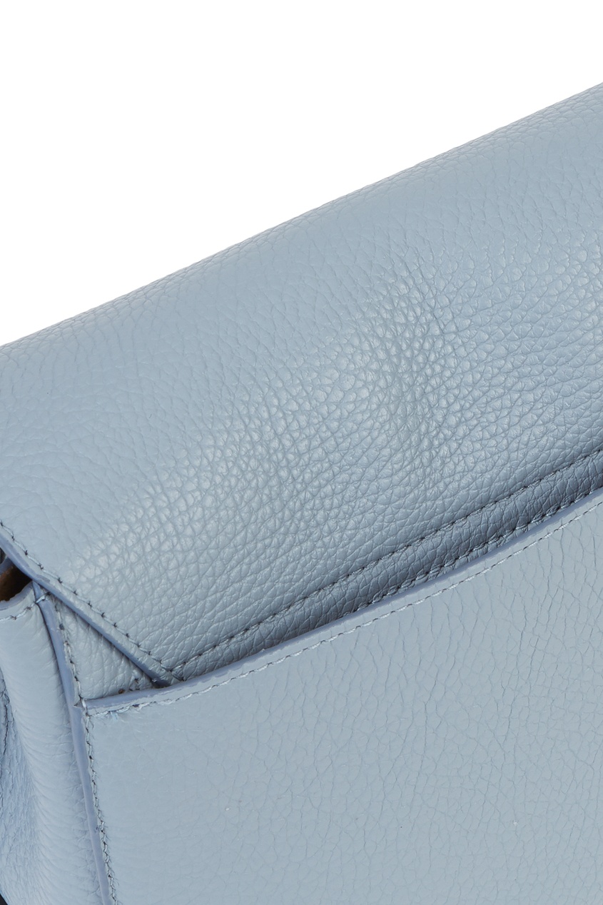 фото Голубая сумка скругленной формы sleek furla