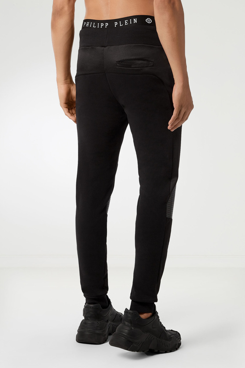 фото Черные брюки с фактурными вставками philipp plein