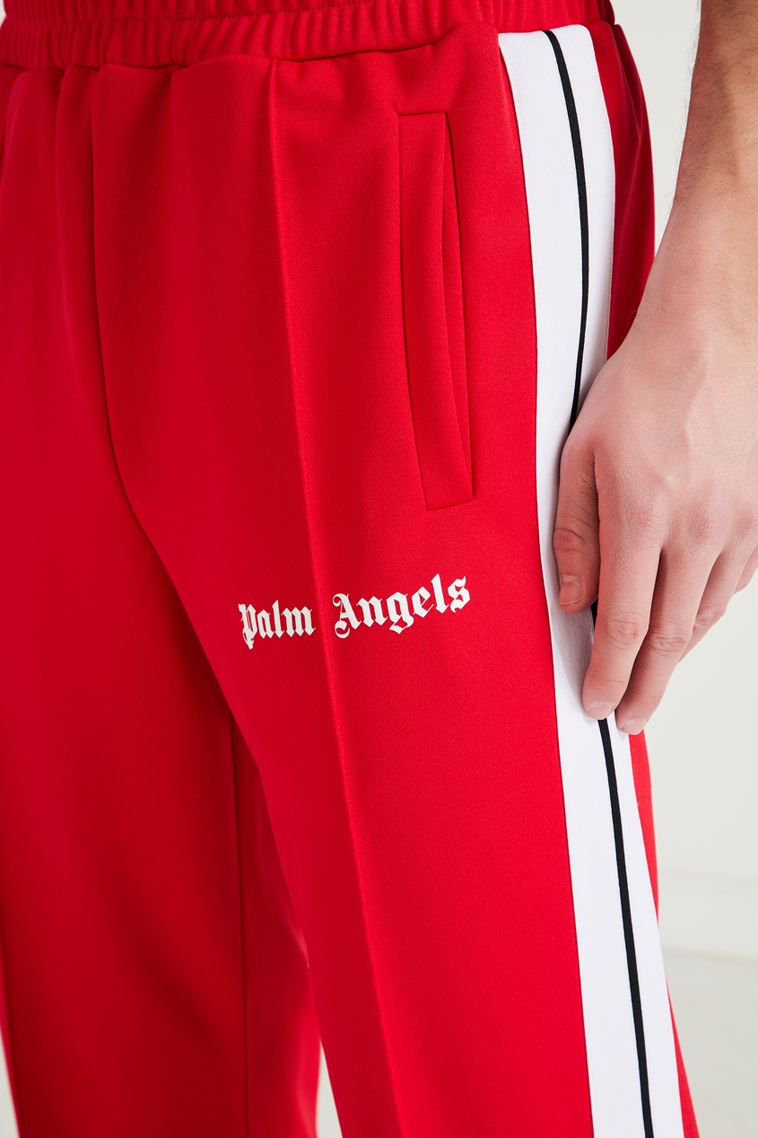 фото Красные брюки с защипами palm angels