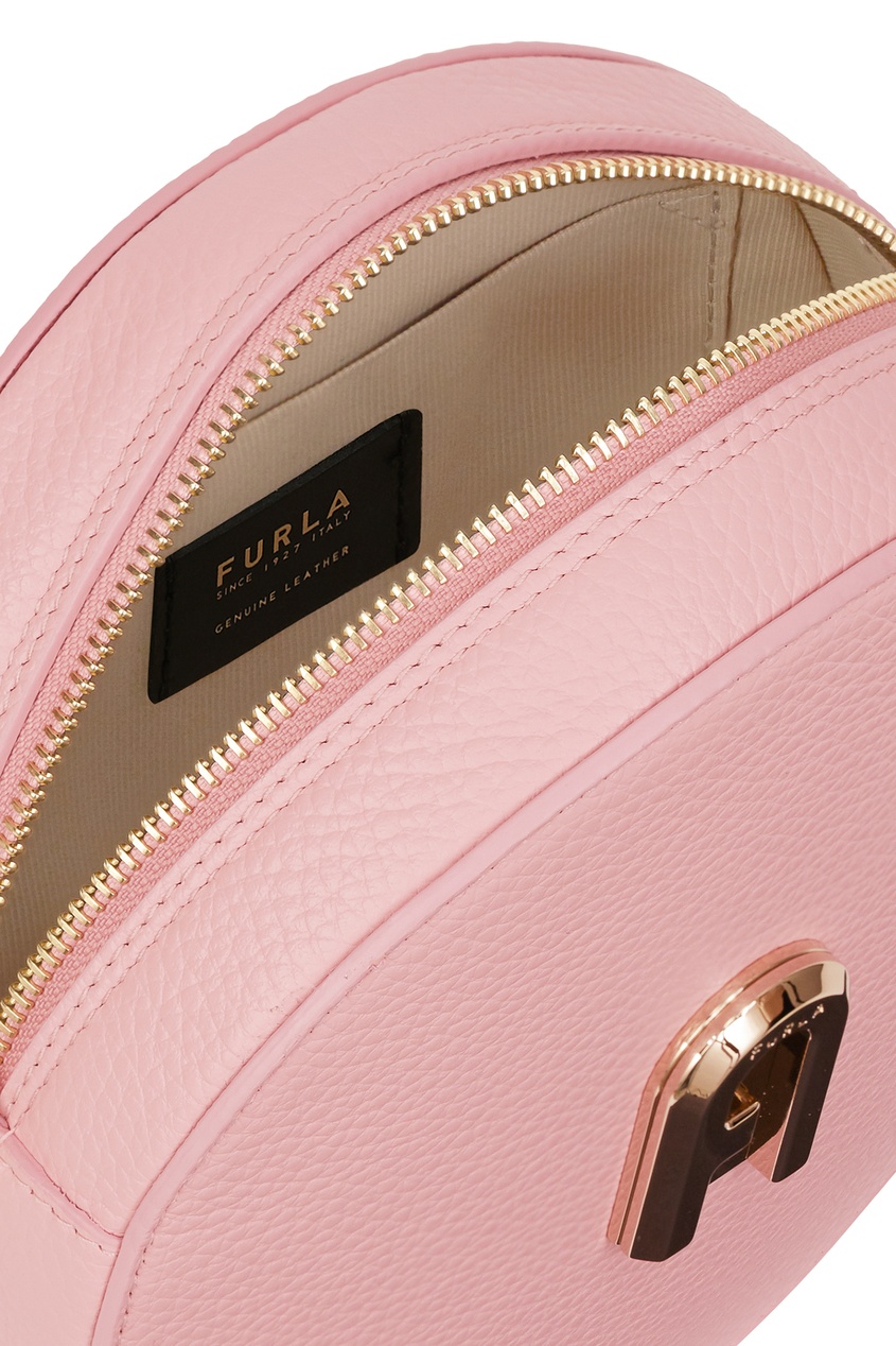 фото Круглая розовая сумка furla sleek из кожи