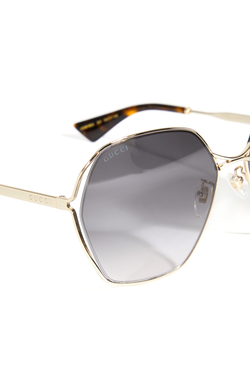 фото Солнцезащитные очки в золотистой оправе gucci