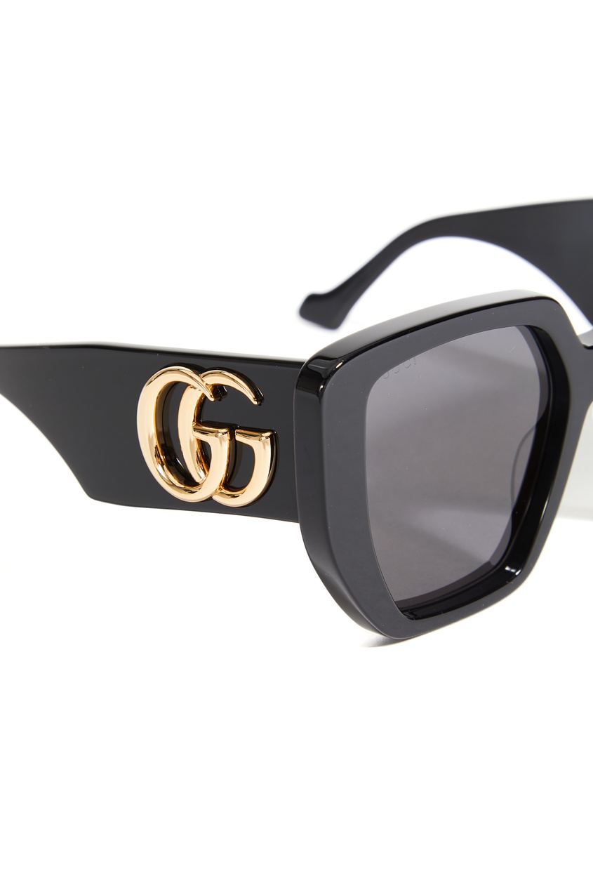 фото Черные солнцезащитные очки с логотипом gucci