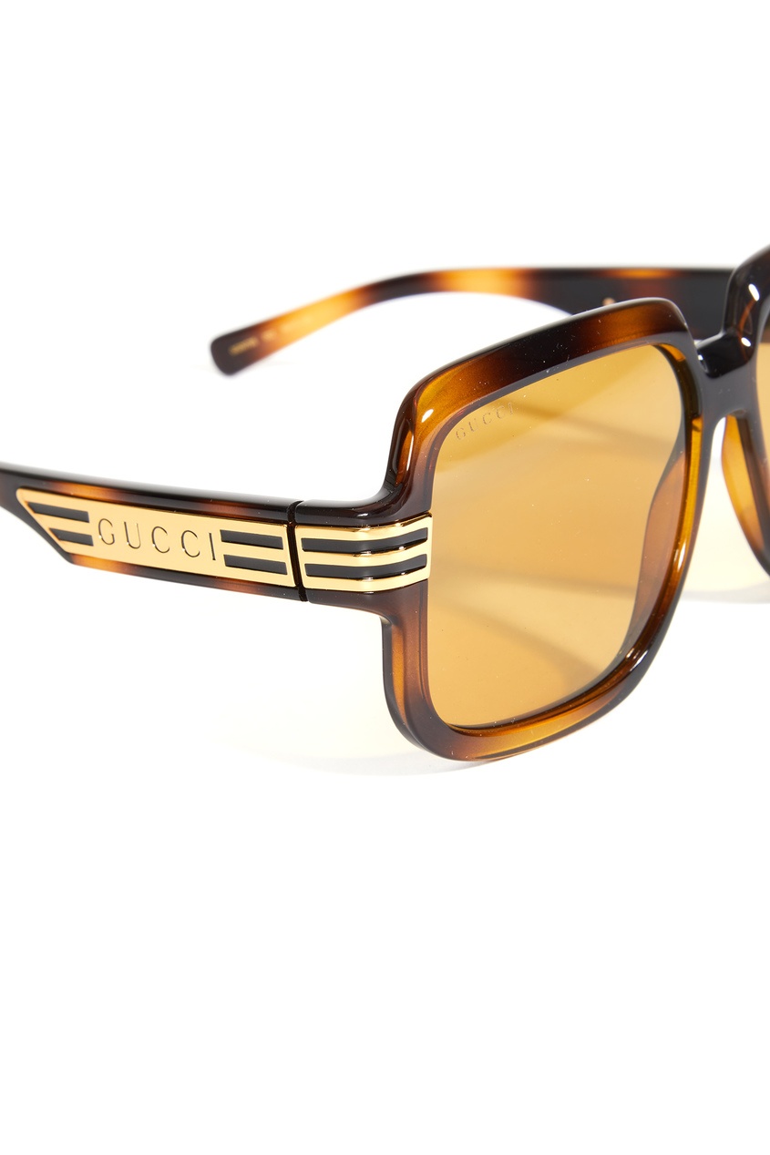 фото Солнцезащитные очки с черепаховым принтом gucci