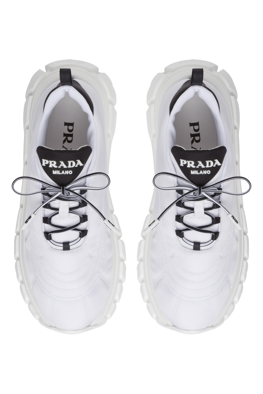 фото Белые кроссовки prada