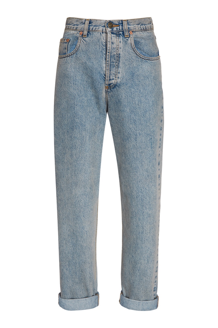 фото «вареные» джинсы с нашивкой gucci
