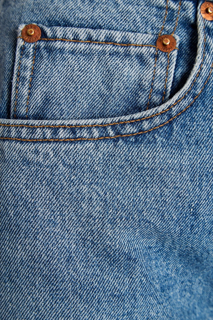 фото Голубые джинсы с потертым эффектом re/done