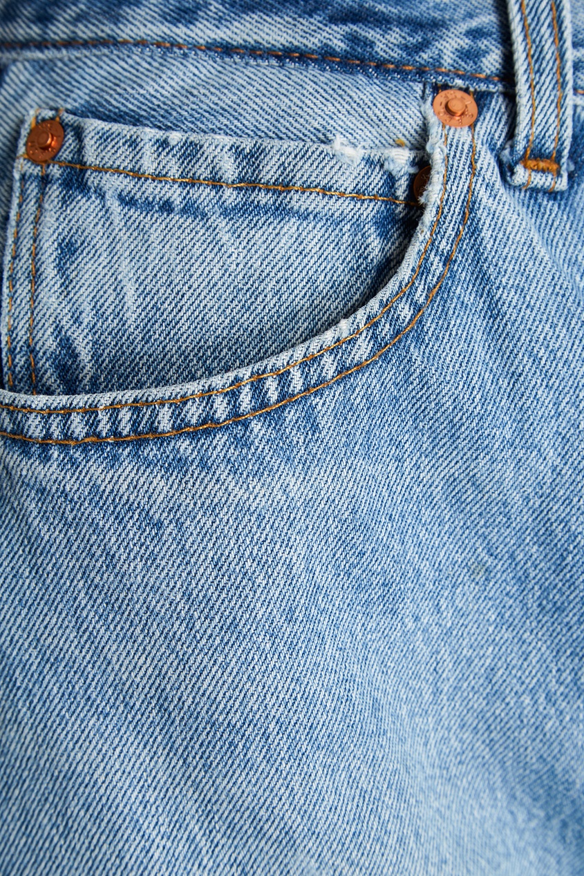 фото Голубые джинсы с необработанными срезами re/done