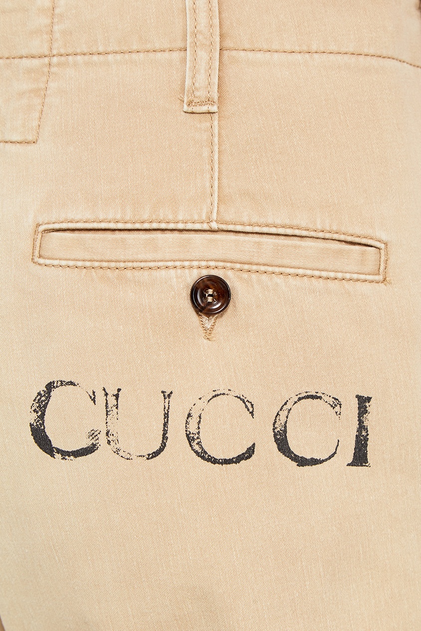 фото Бежевые брюки из хлопка Gucci man