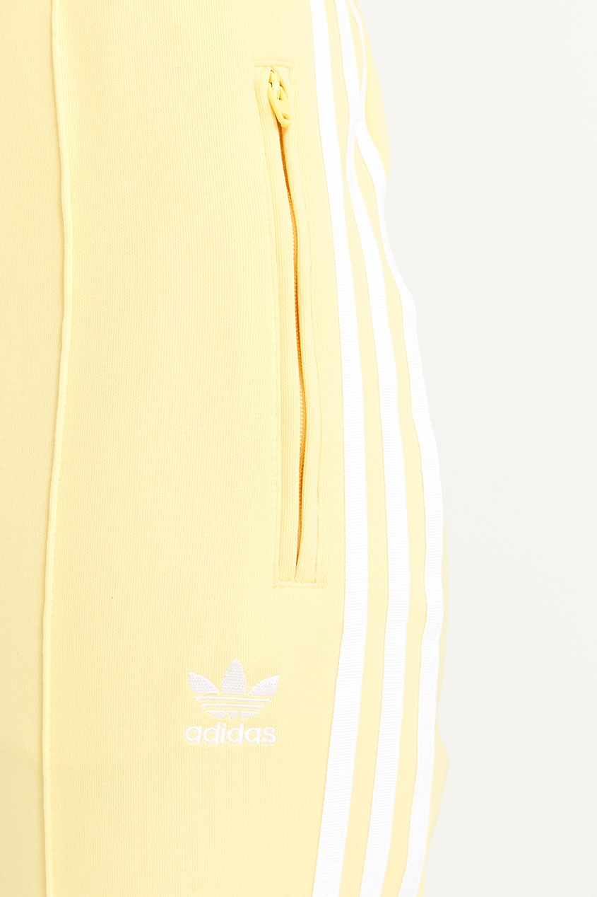 фото Желтые спортивные брюки SST Adidas
