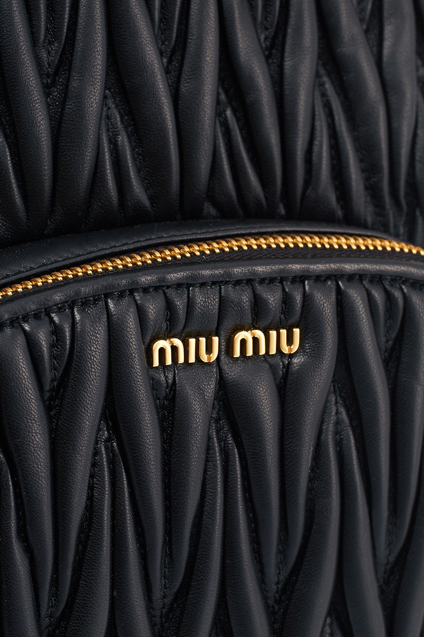 фото Кожаный рюкзак с рельефной отделкой Miu miu