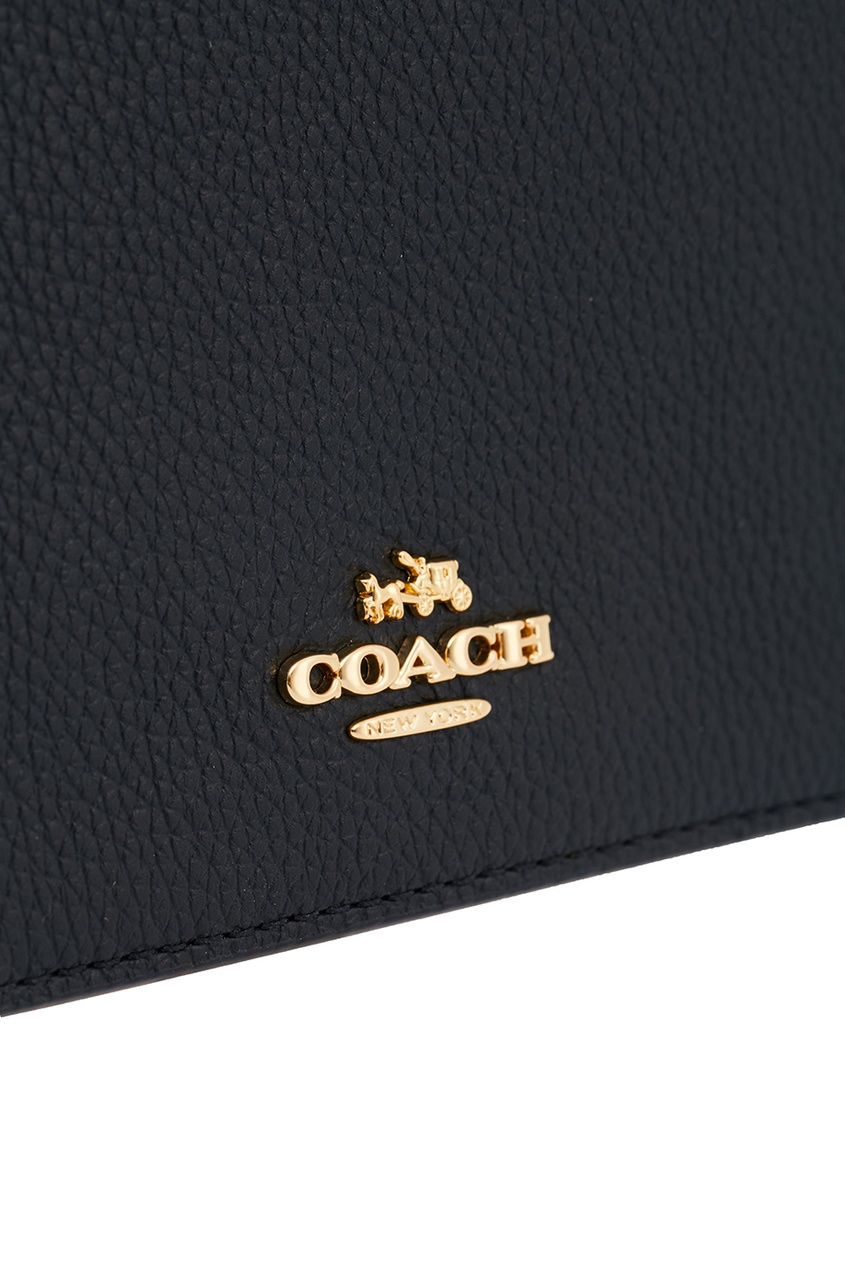 фото Черная сумка с логотипом foldover coach