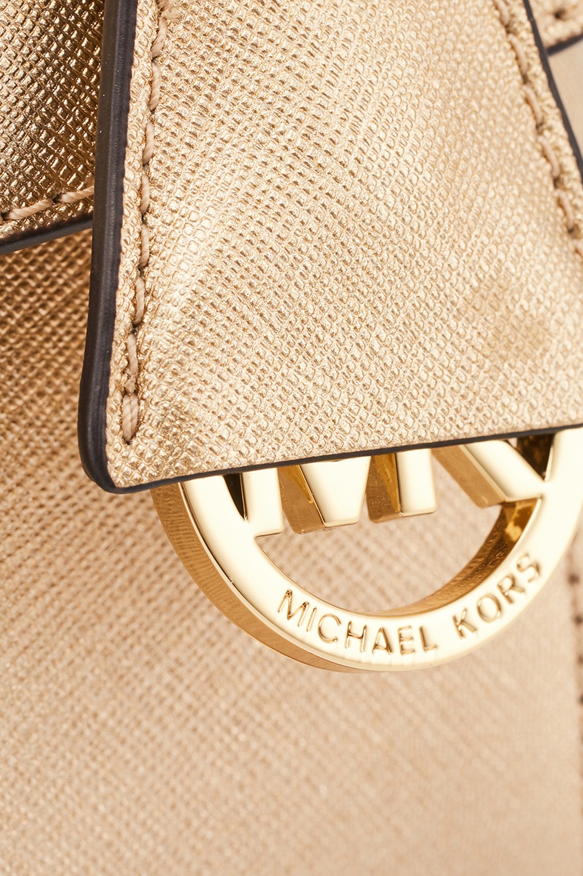 фото Золотистая кожаная сумка crossbodies michael kors