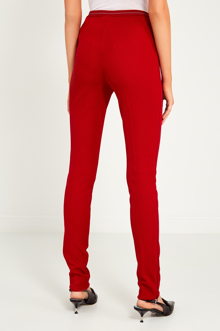 фото Красные трикотажные брюки с логотипом prada