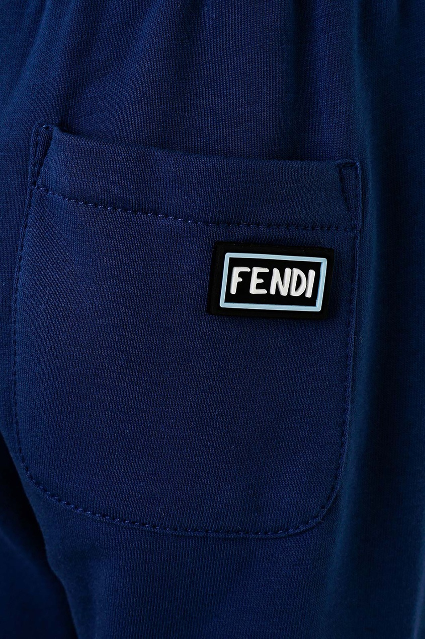 фото Синие брюки с подворотами fendi