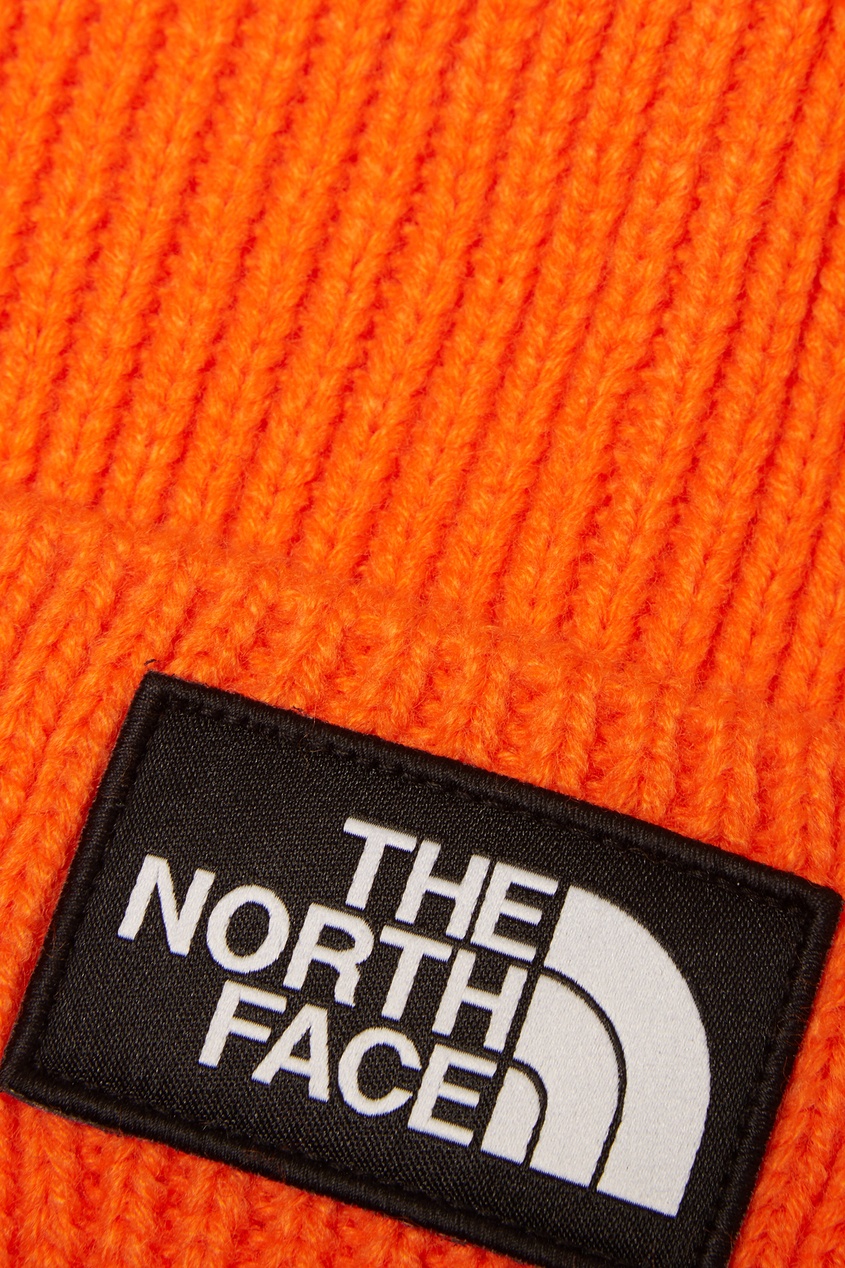 фото Оранжевая шапка с логотипом The north face