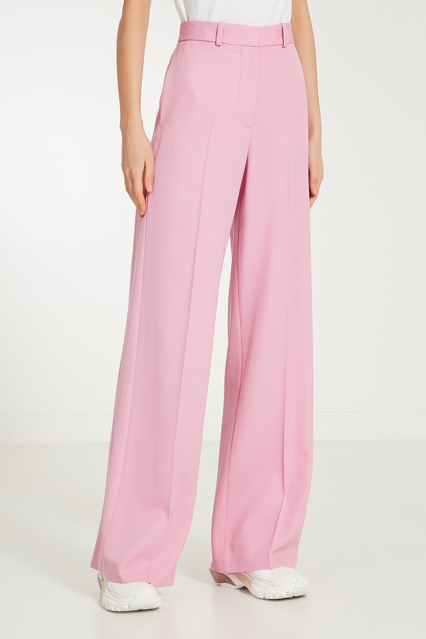 Широкие брюки женские 2024. Розовые широкие штаны. Розовые брюки женские широкие. Розовые брюки женские. Розовые штаны женские широкие.