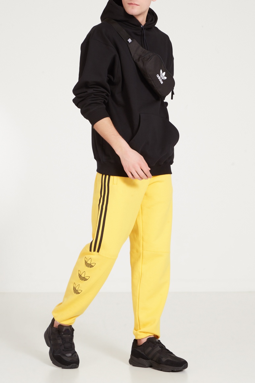 фото Желтые брюки tourney trefoil adidas