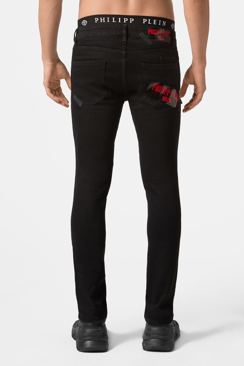 фото Черные джинсы с логотипами Philipp plein