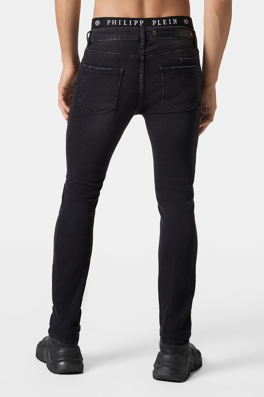 фото Черные джинсовые брюки с прорезями Philipp plein