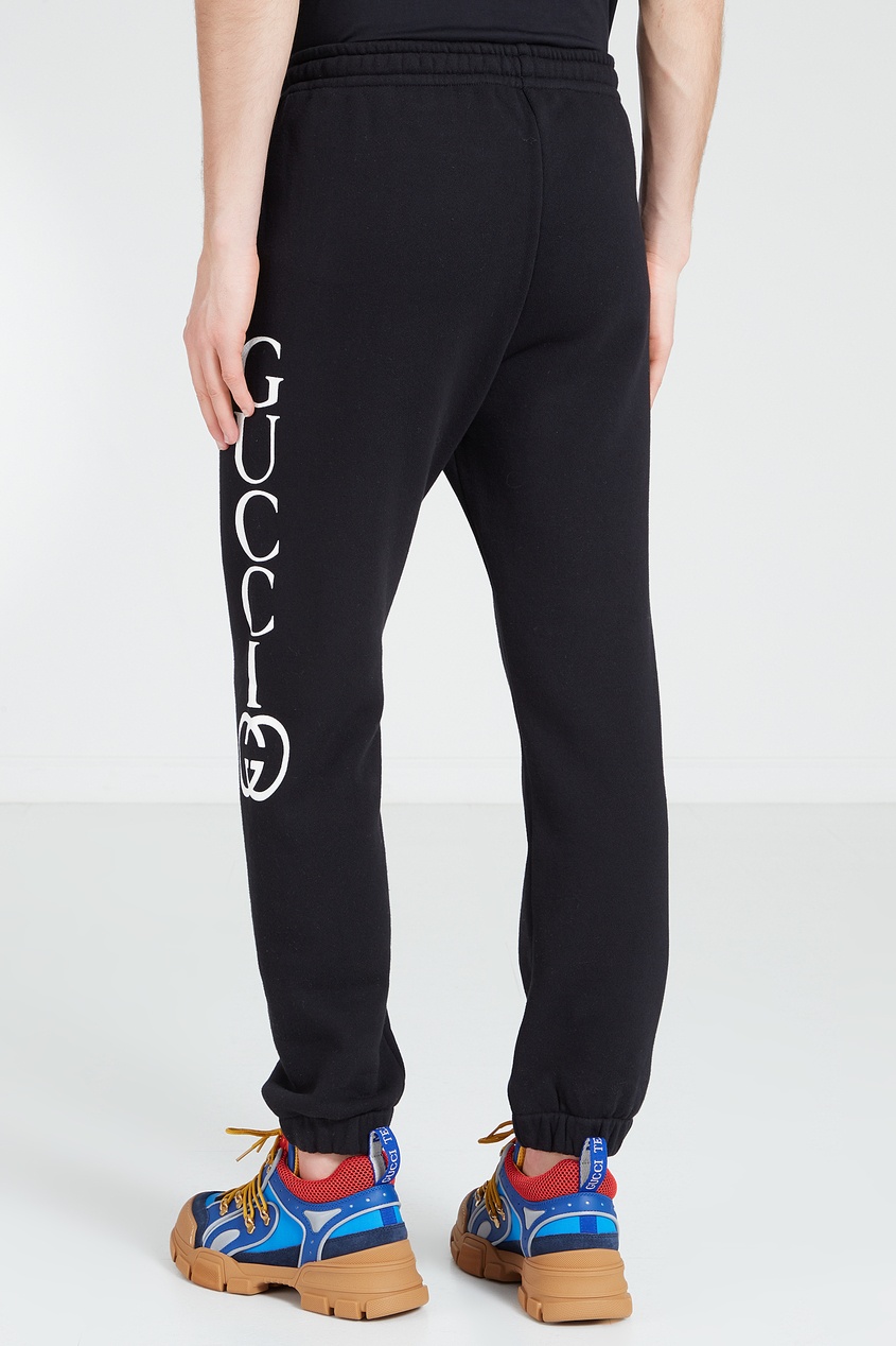 фото Черные брюки с логотипом gucci