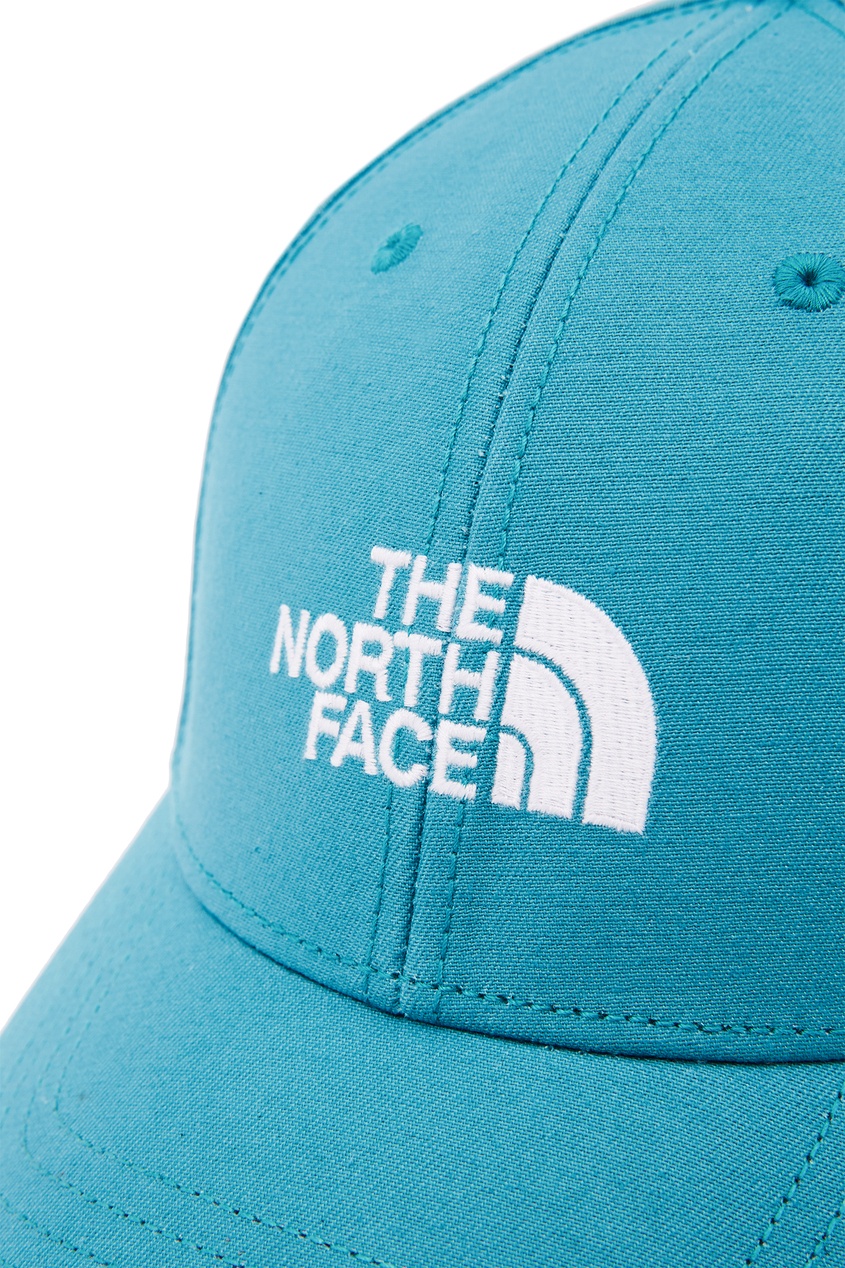фото Голубая бейсболка с белым логотипом The north face