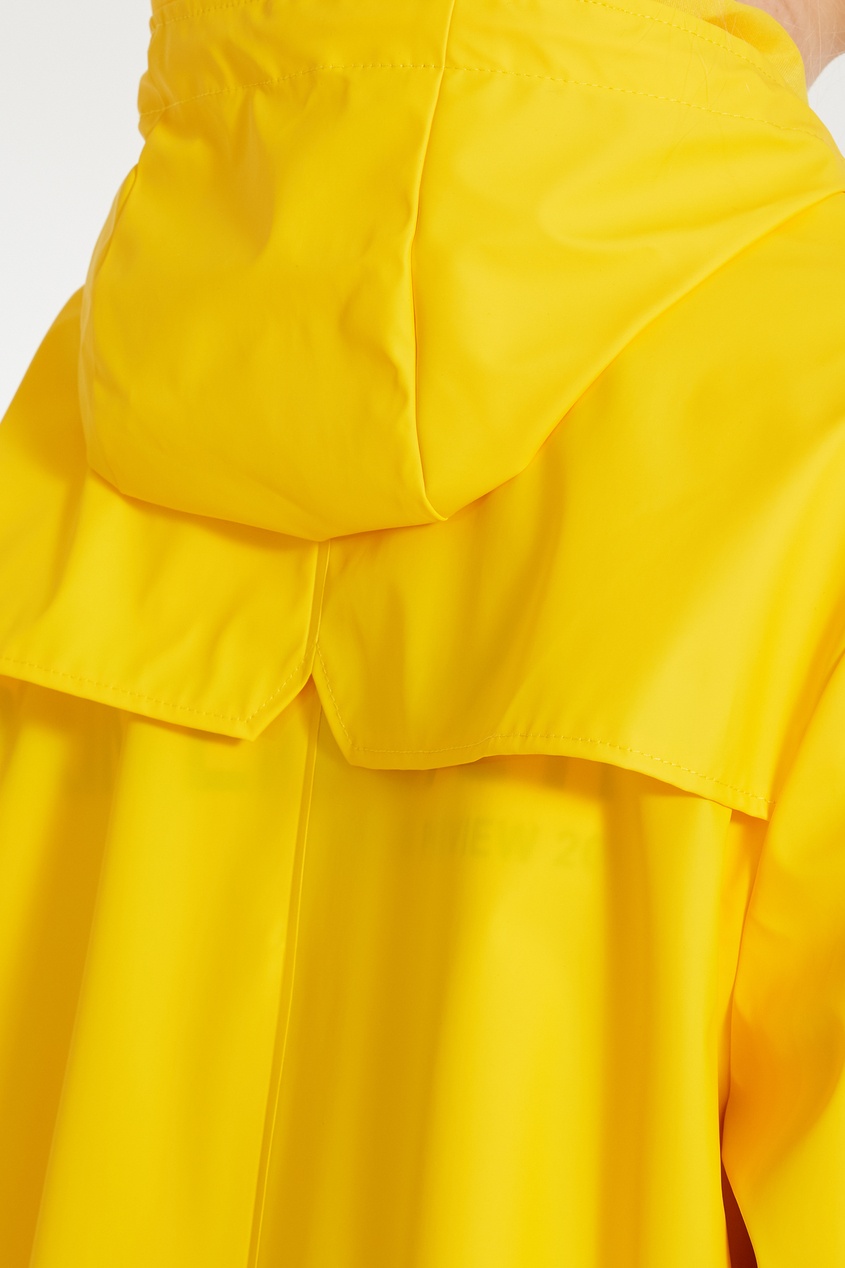 фото Желтая непромокаемая куртка Rains
