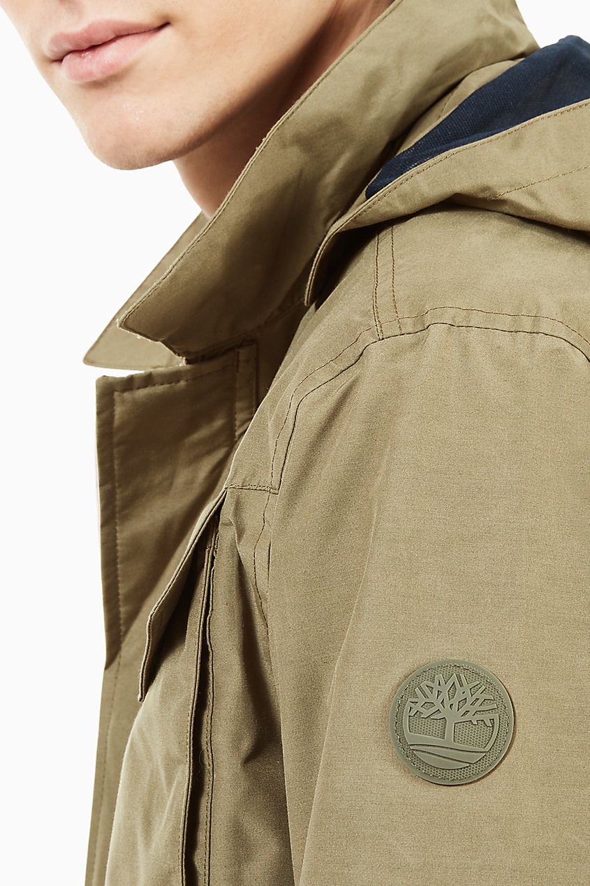 фото Бежевая куртка с капюшоном timberland