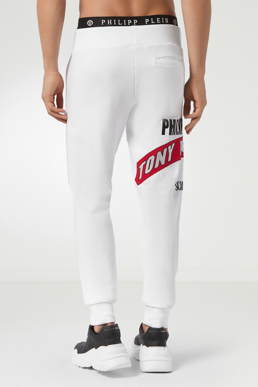 фото Белые брюки с отделкой philipp plein