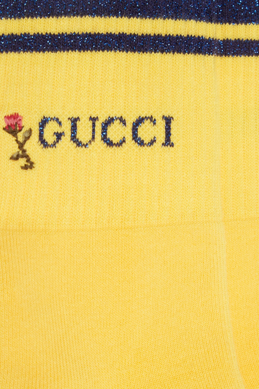 фото Желтые носки с синим логотипом gucci