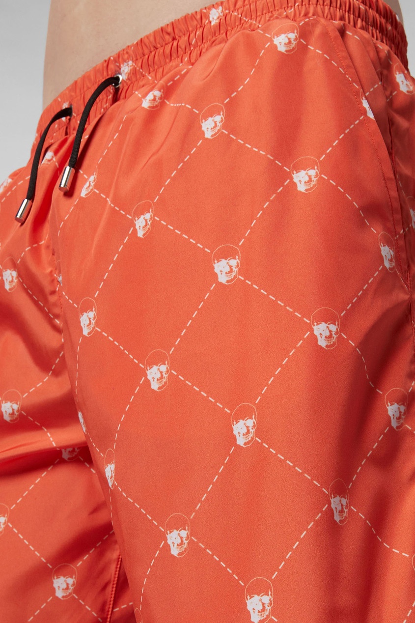 фото Оранжевые пляжные шорты с узором Philipp plein