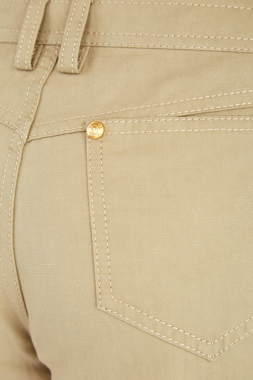 фото Короткие бежевые шорты с пуговицами balmain