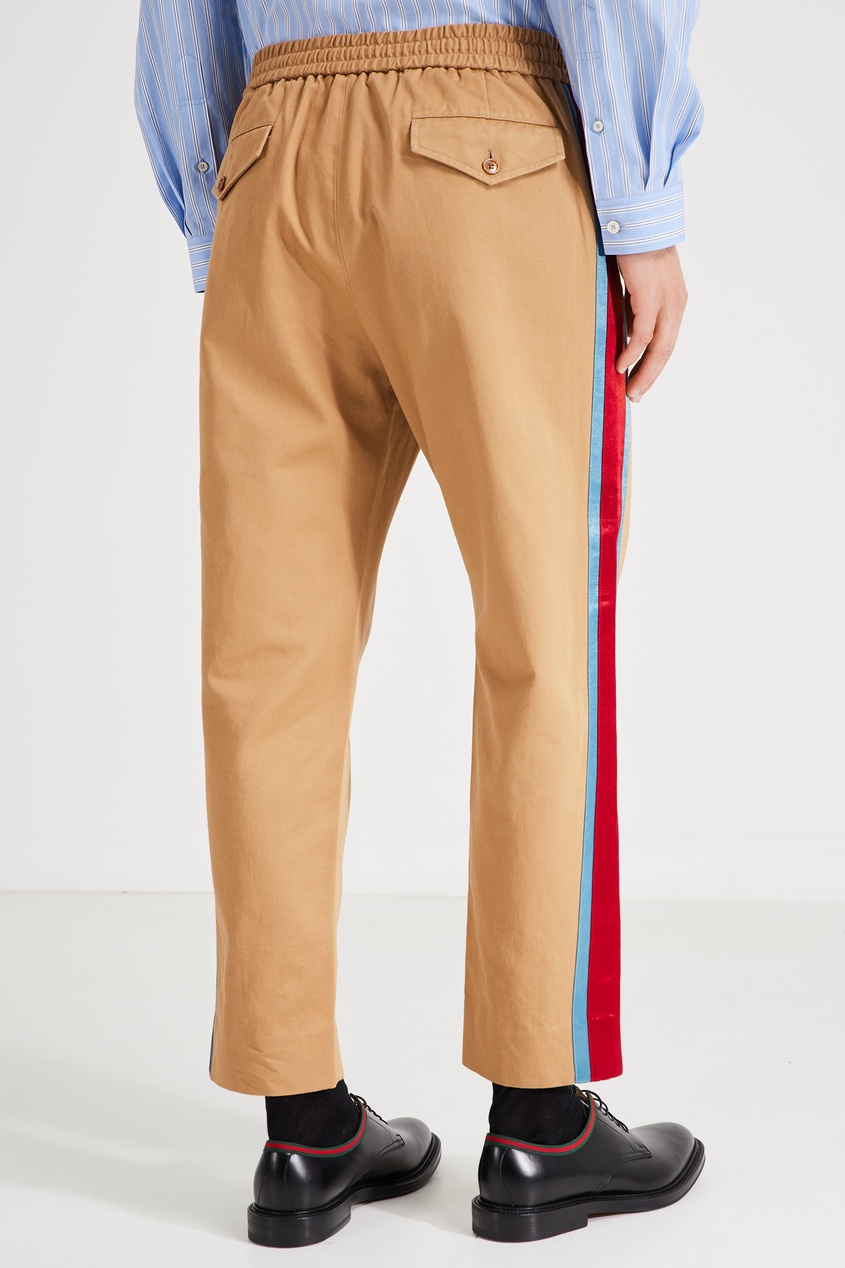 фото Бежевые брюки с цветными лампасами Gucci man