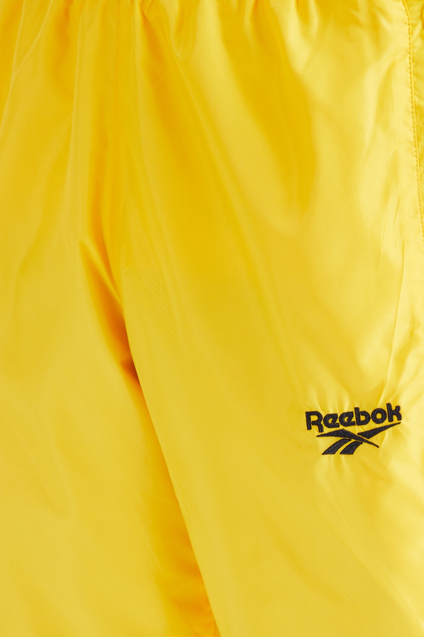 фото Желтые спортивные брюки classics vector reebok