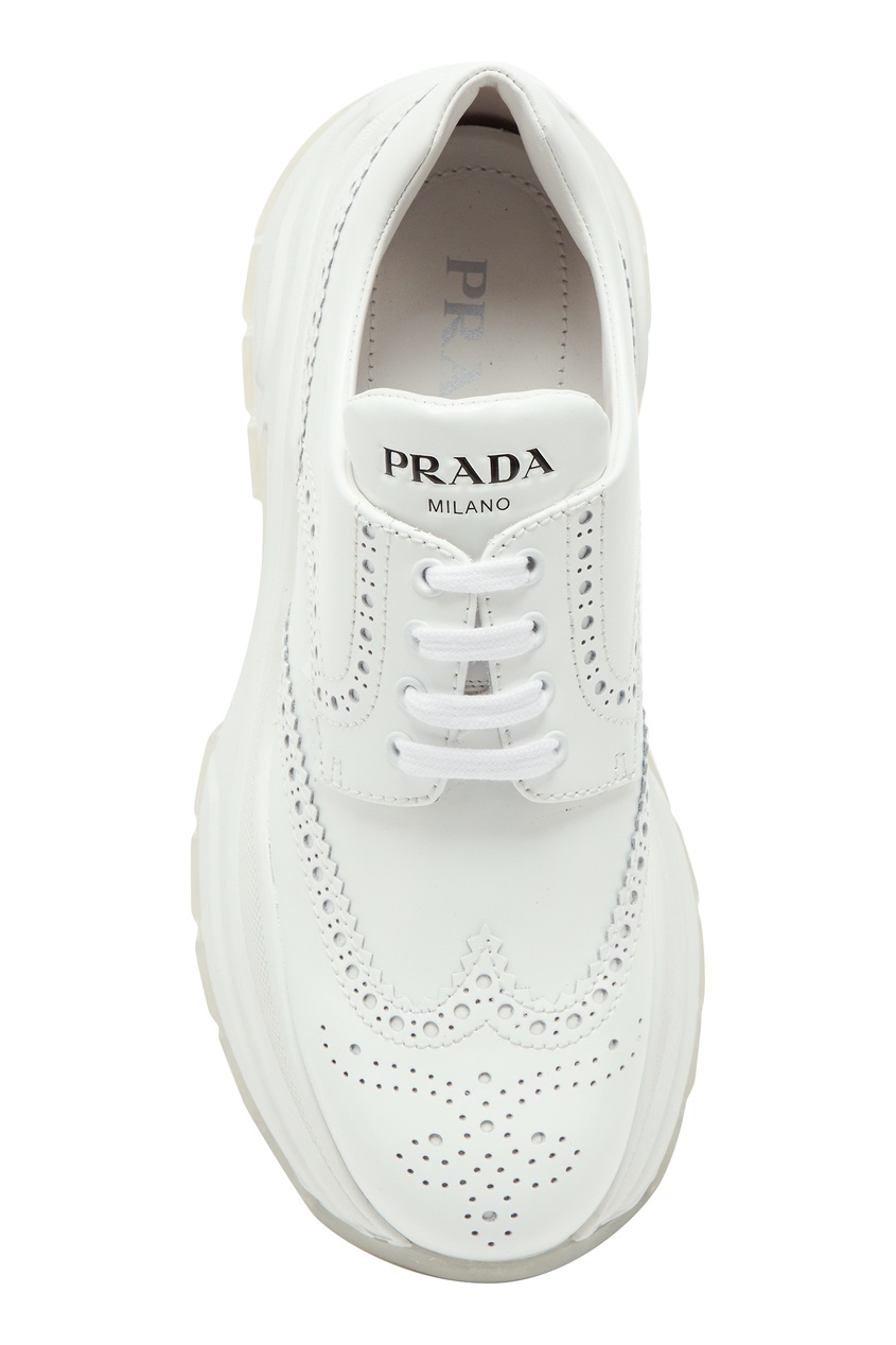 фото Белые кроссовки с перфорацией Prada
