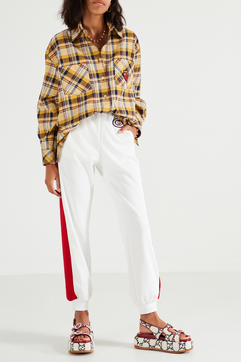 фото Спортивные брюки с контрастной отделкой и логотипом Gucci