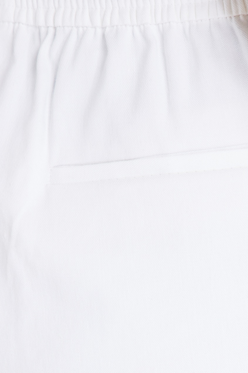 фото Льняные брюки молочно-белого цвета St. john