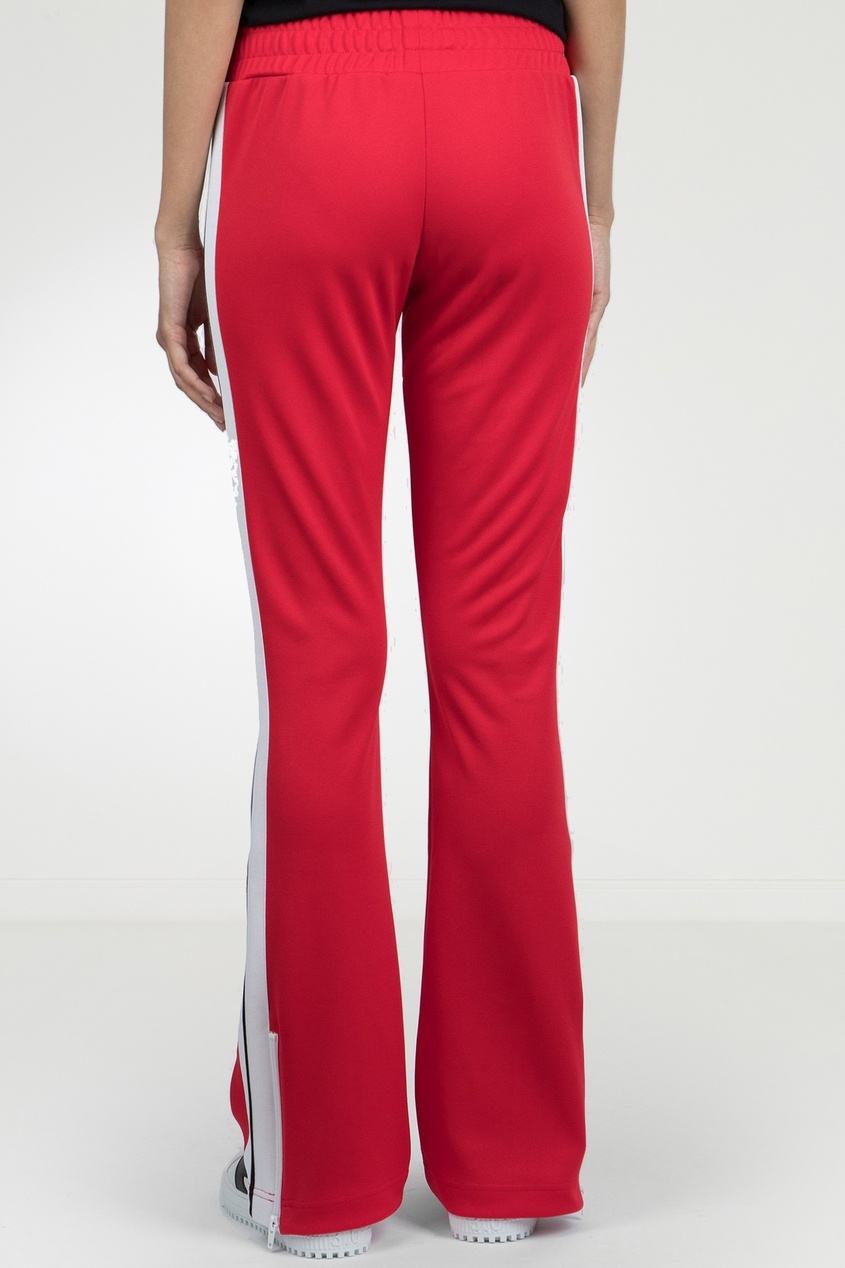 фото Красные расклешенные брюки-джоггеры palm angels