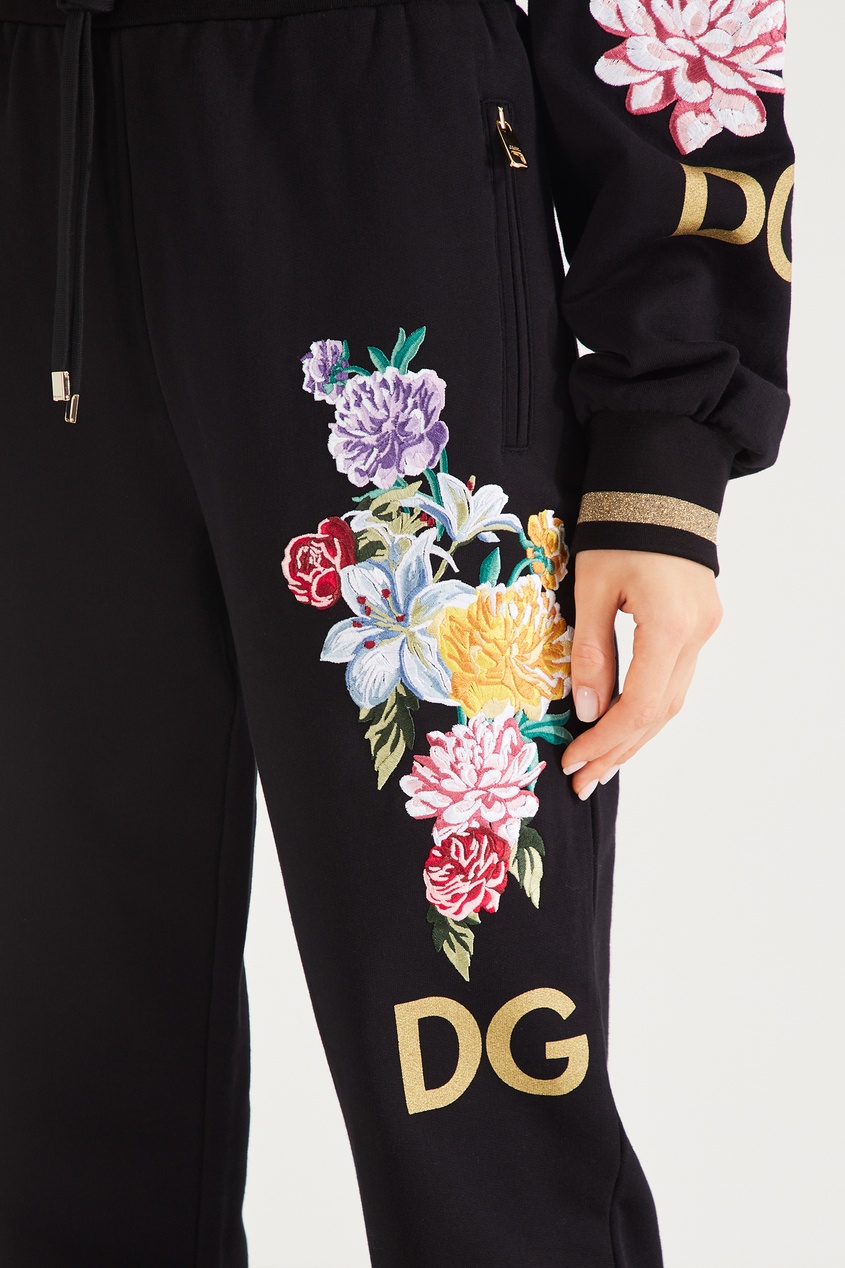 фото Черные брюки-джоггеры с цветочным рисунком Dolce&gabbana