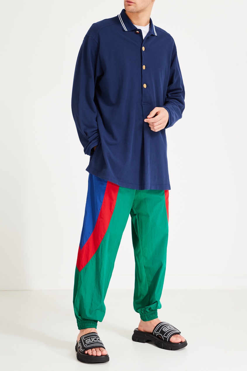 фото Зеленые брюки с контрастными вставками gucci