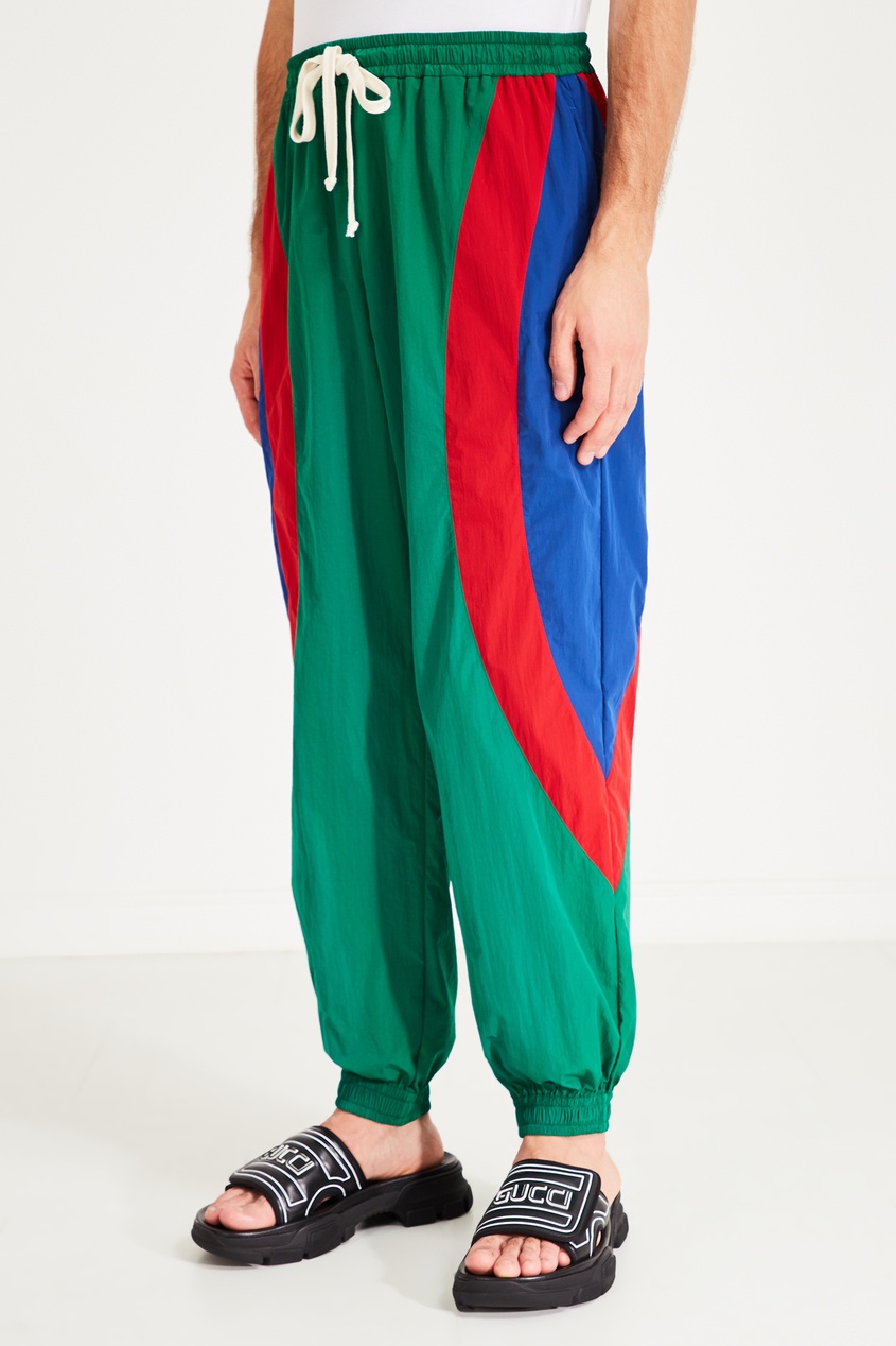 фото Зеленые брюки с контрастными вставками gucci