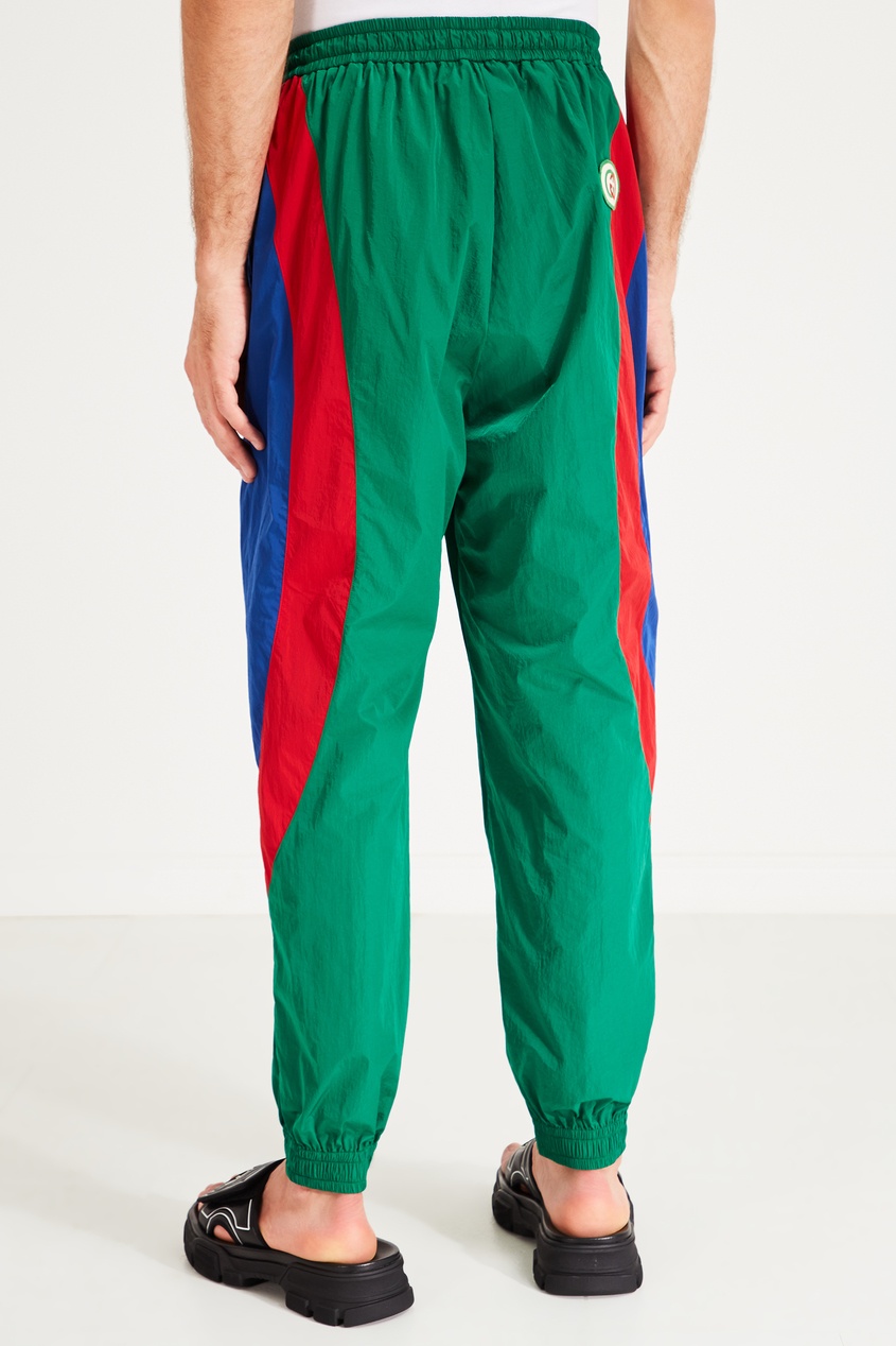 фото Зеленые брюки с контрастными вставками Gucci man