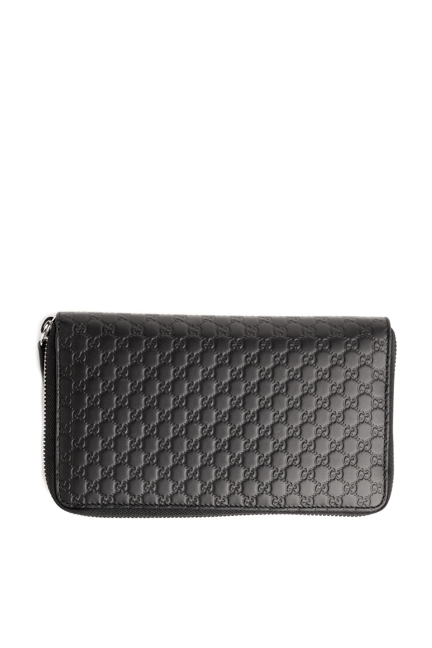фото Черное кожаное портмоне с тисненым мотивом GG Gucci